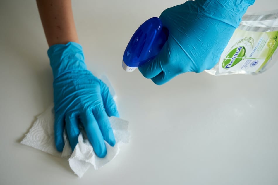 A person cleaning. 