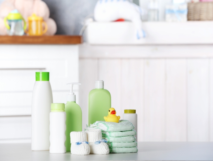 Baby diapers and essentials on the bathroom.
