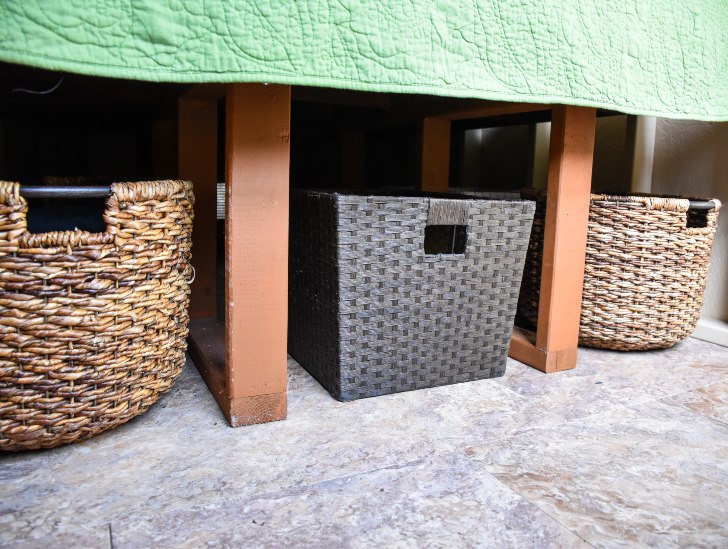 Basket under the bed.