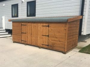 A wooden outdoor storage box.