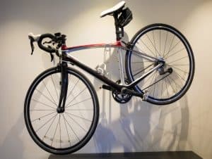 Bike hanging on wall.