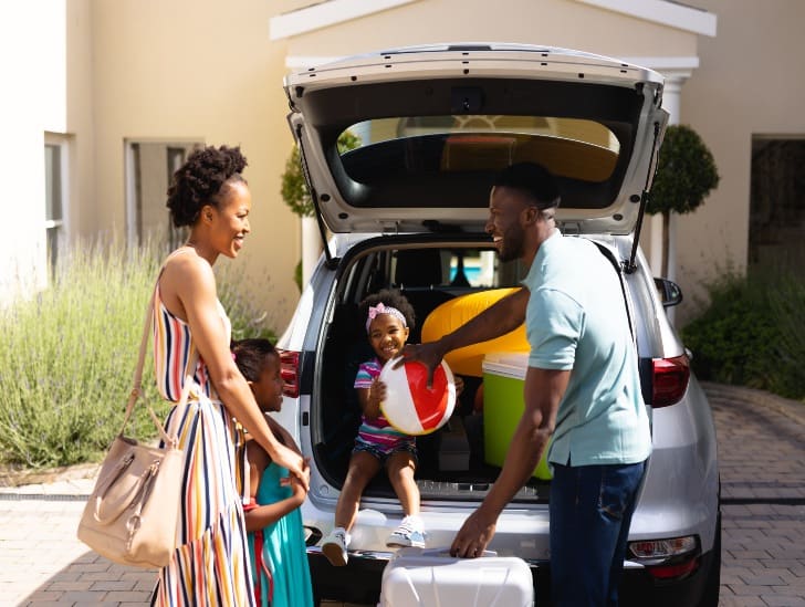 Family packing for roadtrip.